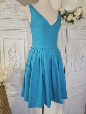 Chloe & Reese Turquoise Sleeveless Deep V-neck Pleated Fit and Flare Swing Dress